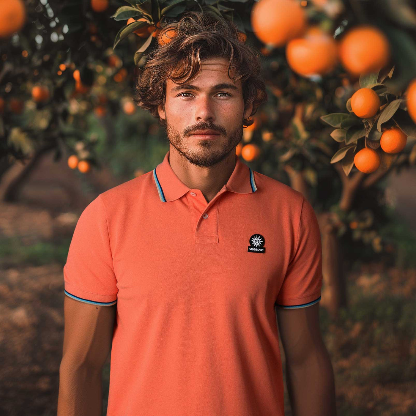 Sandbanks Badge Logo Tipped Polo Shirt in Coral Model