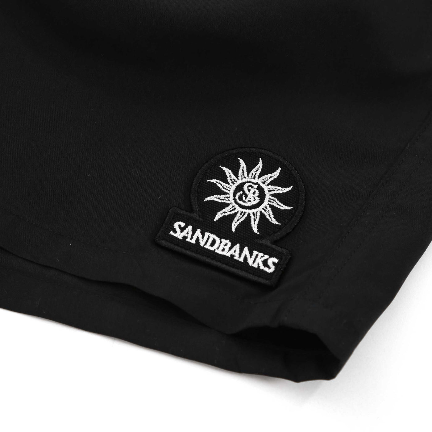 Sandbanks Badge Logo Swim Shorts in Black Logo