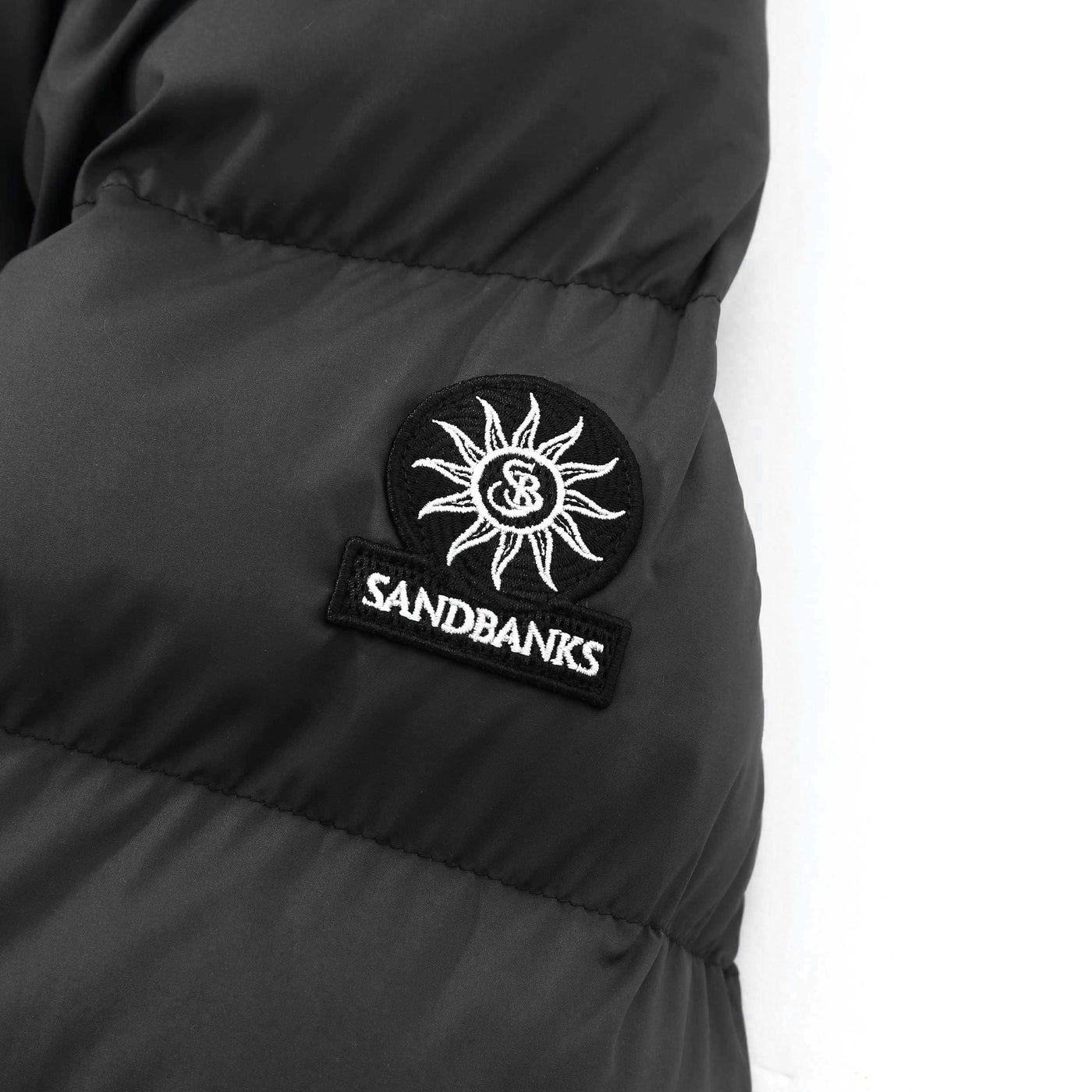 Sandbanks Ravine Mid Puffer Jacket in Black Logo