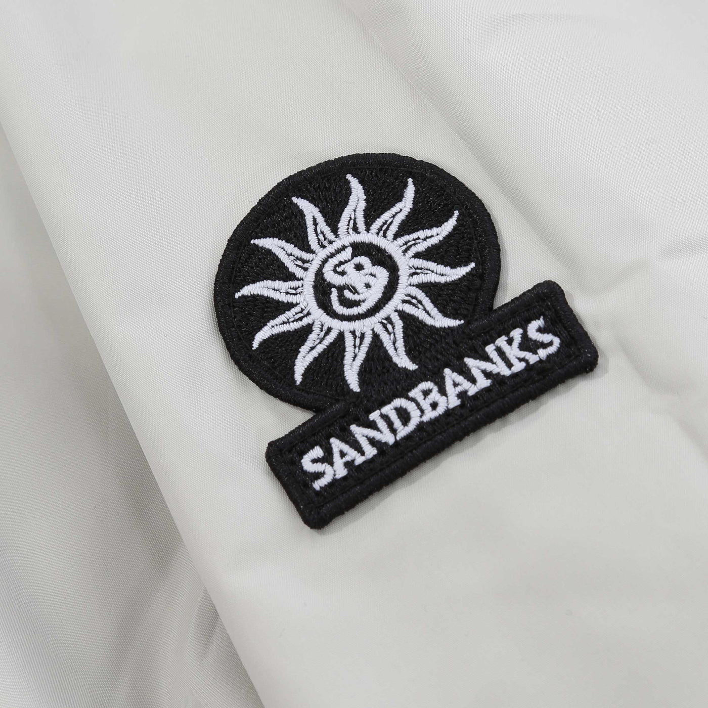 Sandbanks Reversible Nylon Funnel Bomber Jacket in Navy Logo