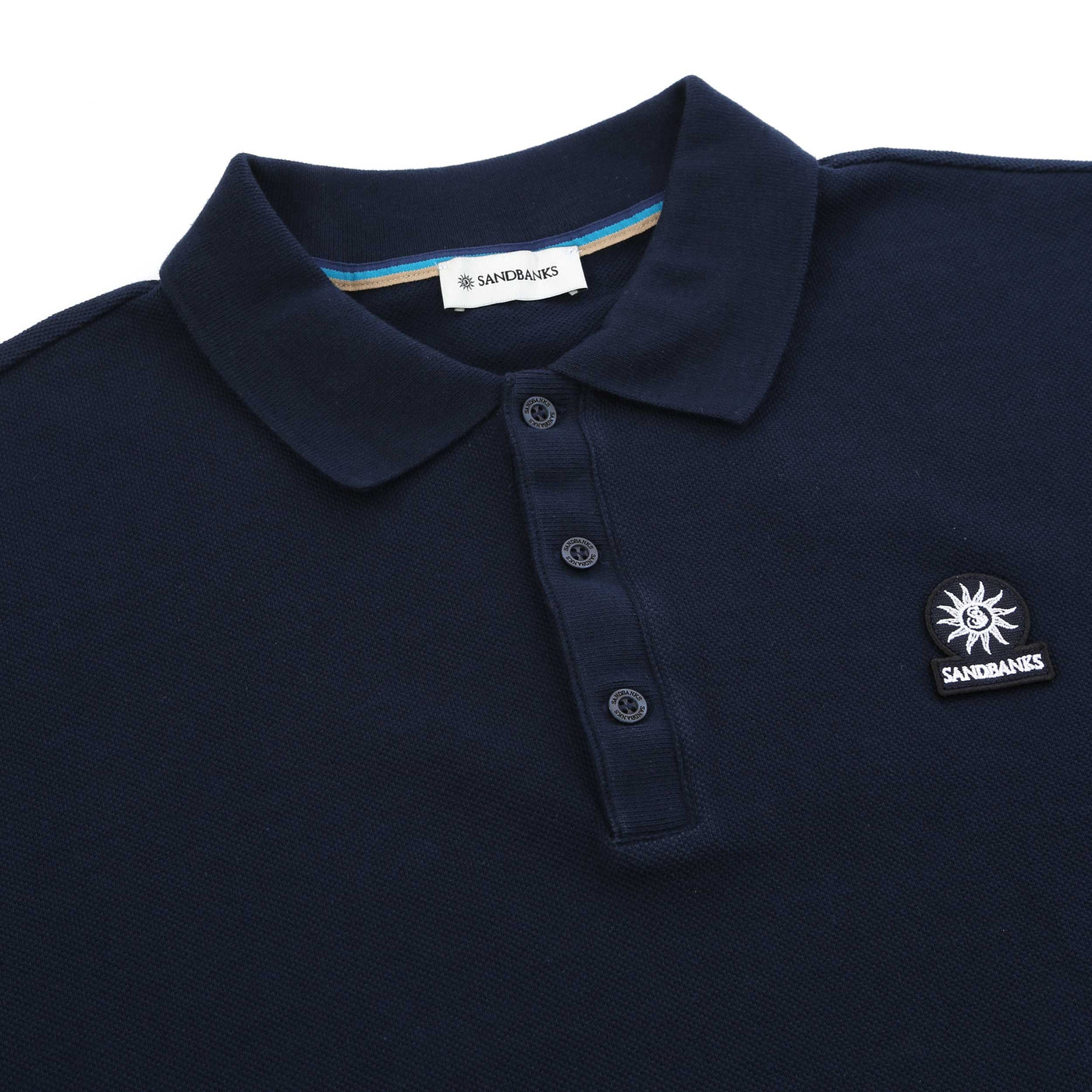 Sandbanks Striped Hem Pique Polo Shirt in Navy Placket